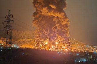 US Bombs Tehran’s Largest Oil Depot as Iran War Intensifies